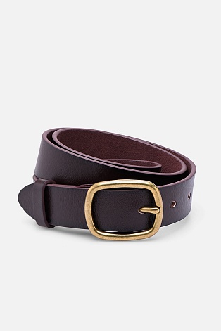 Кожаный ремень с круглой пряжкой